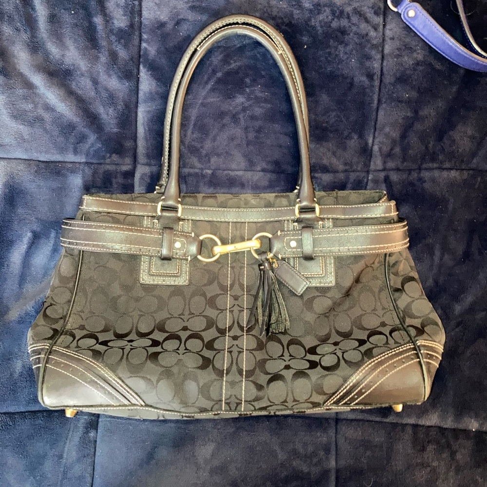 Black Coach Signature tote. gently used. Still in great condition.